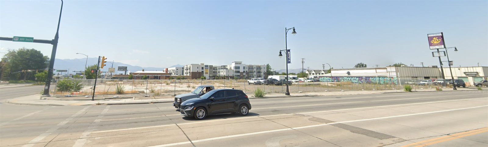 A vacant lot on a wide downtown Provo road today
